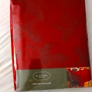 New in package/ St. Nicholas Square Holly Berry 60" x 120" Oblong Red Tablecloth